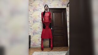 Sissy slut poses in a chastity belt and with a plug